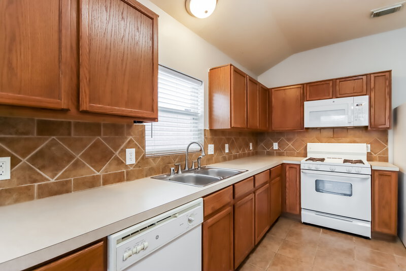 1,720/Mo, 18326 Atasca Woods Trce Humble, TX 77346 Kitchen View 2