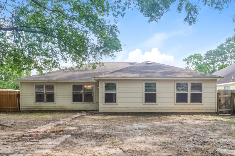 1,715/Mo, 9808 Woodhollow Dr Conroe, TX 77385 Rear View