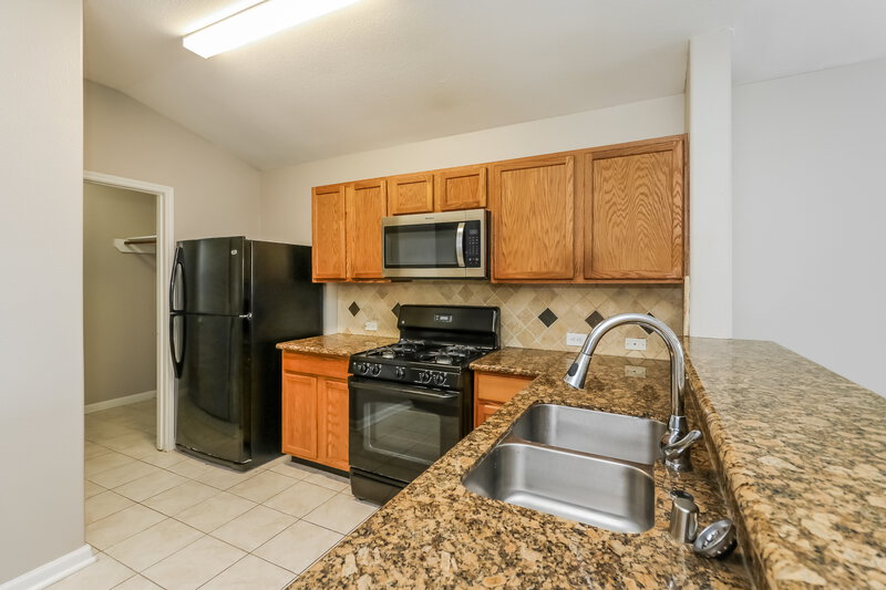 2,085/Mo, 7710 Painted Desert Dr Cypress, TX 77433 Kitchen View 2