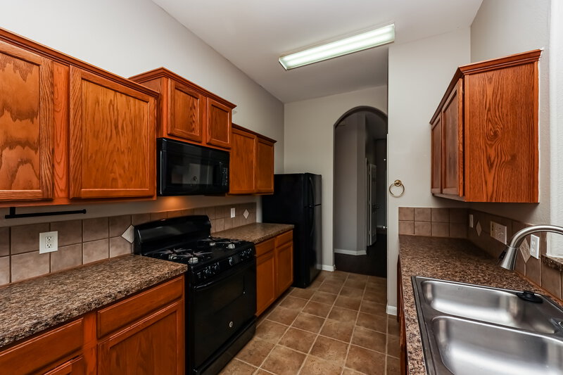 1,955/Mo, 5707 Coyote Call Ct Katy, TX 77449 Kitchen View 2