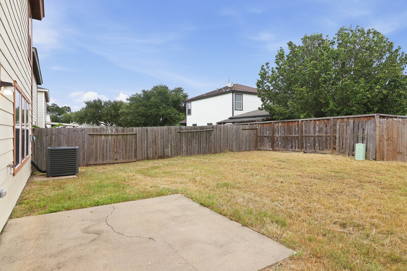 1,685/Mo, 16406 Chandler Ridge Ln Cypress, TX 77429 Backyard View