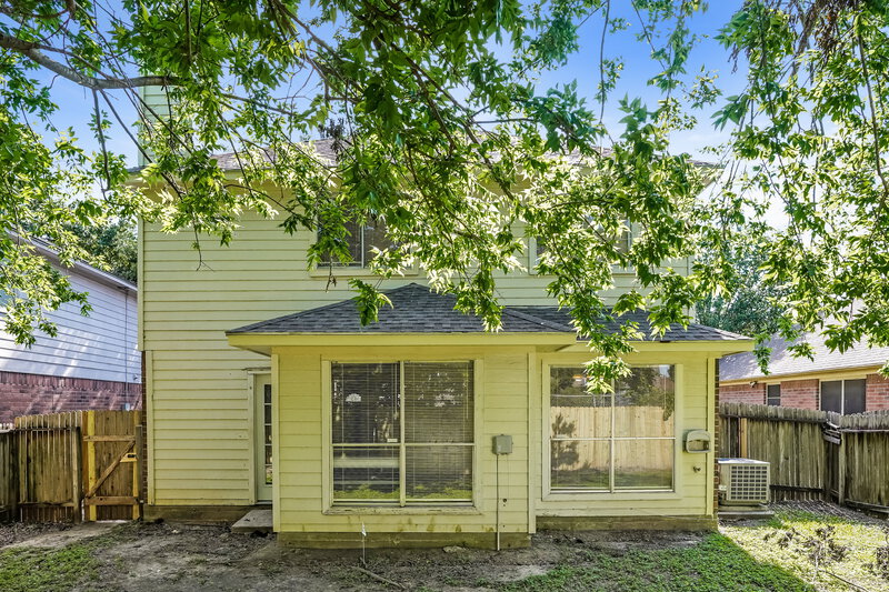 1,715/Mo, 8710 High Mountain Dr Houston, TX 77088 Rear View