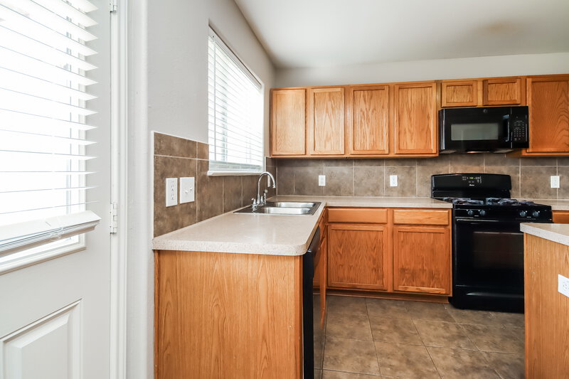 2,470/Mo, 1810 Skipwood Dr Missouri City, TX 77489 Kitchen View 2