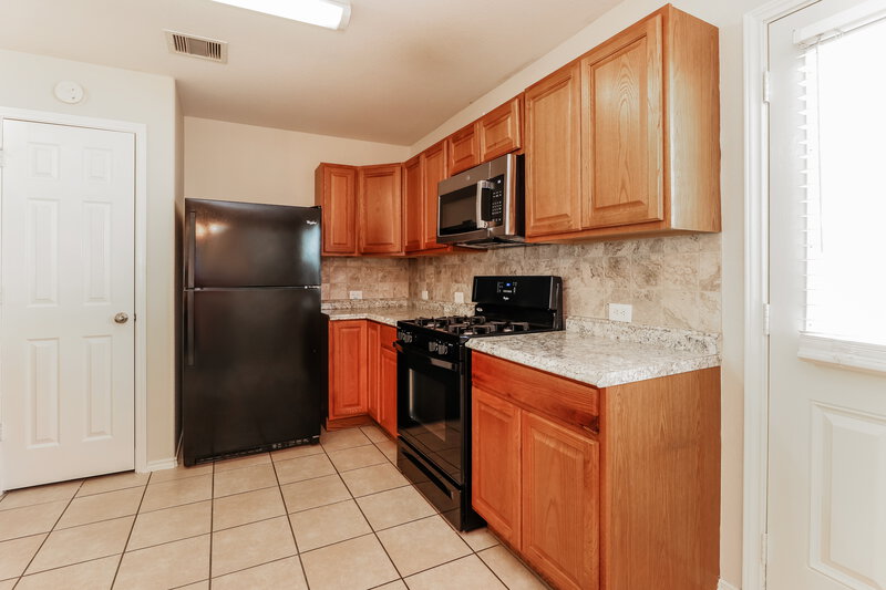 1,835/Mo, 13439 Lauren Forest Ln Houston, TX 77044 Kitchen View 2