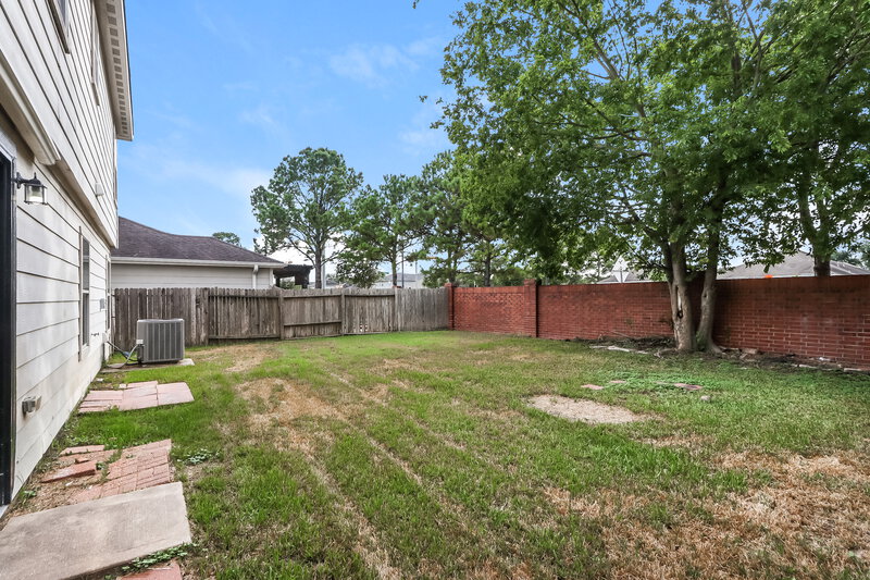 1,895/Mo, 19811 Breezy Cove Ct Tomball, TX 77375 Rear View