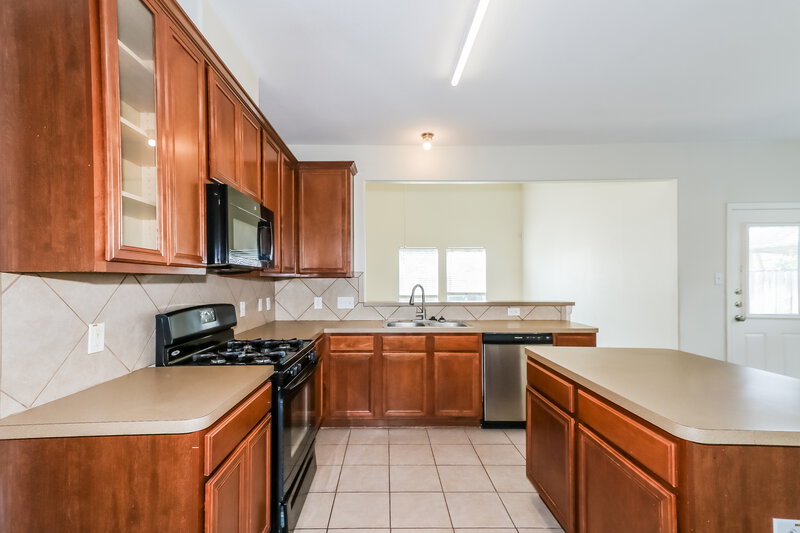 2,135/Mo, 10007 Barr Lake Dr Houston, TX 77095 Kitchen View 2