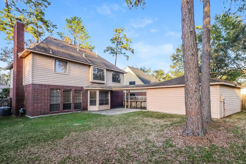 2,130/Mo, 5111 Natural Bridge Dr Kingwood, TX 77345 Rear View