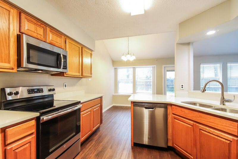 1,695/Mo, 5207 Village Springs Dr Kingwood, TX 77339 Kitchen View 2