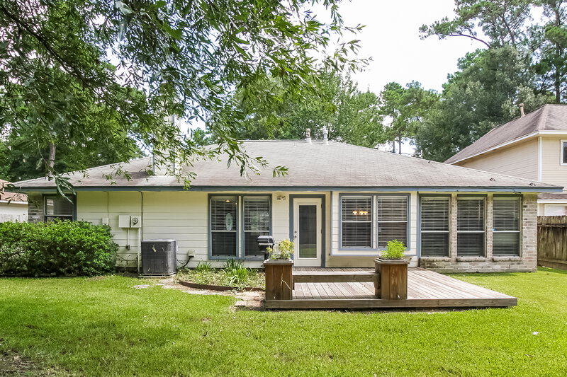 2,135/Mo, 5207 Village Springs Dr Kingwood, TX 77339 Rear View