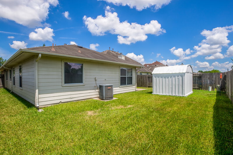 2,050/Mo, 4003 Teal Run Meadows Dr Fresno, TX 77545 Rear View
