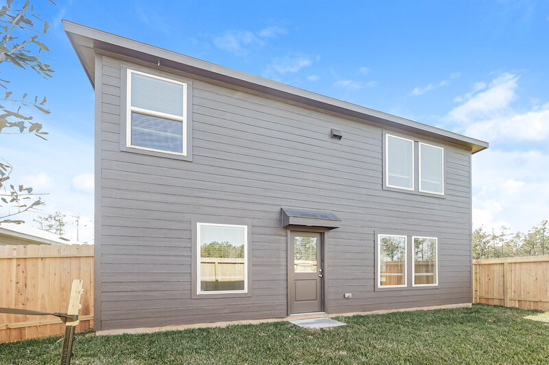 1,850/Mo, 2613 Shady Cedar Ct Conroe, TX 77301 Rear View