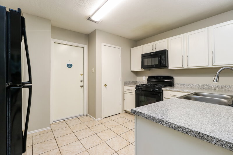 1,935/Mo, 11710 Sandy Stream Dr Tomball, TX 77375 Kitchen View 2