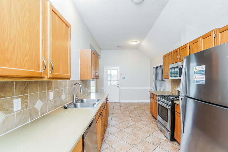 1,880/Mo, 5915 Woodmancote Dr Humble, TX 77346 Kitchen View 2