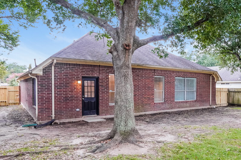 1,880/Mo, 5915 Woodmancote Dr Humble, TX 77346 Rear View 2