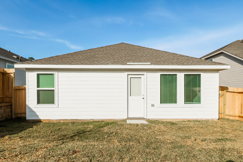 1,605/Mo, 609 Craven St Montgomery, TX 77316 Rear View