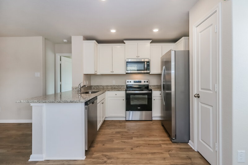 1,740/Mo, 7542 Tipton Meadow Way Richmond, TX 77469 Kitchen View 2