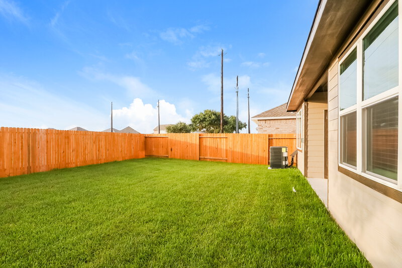 1,815/Mo, 7638 Tipton Meadow Way Richmond, TX 77469 Backyard View