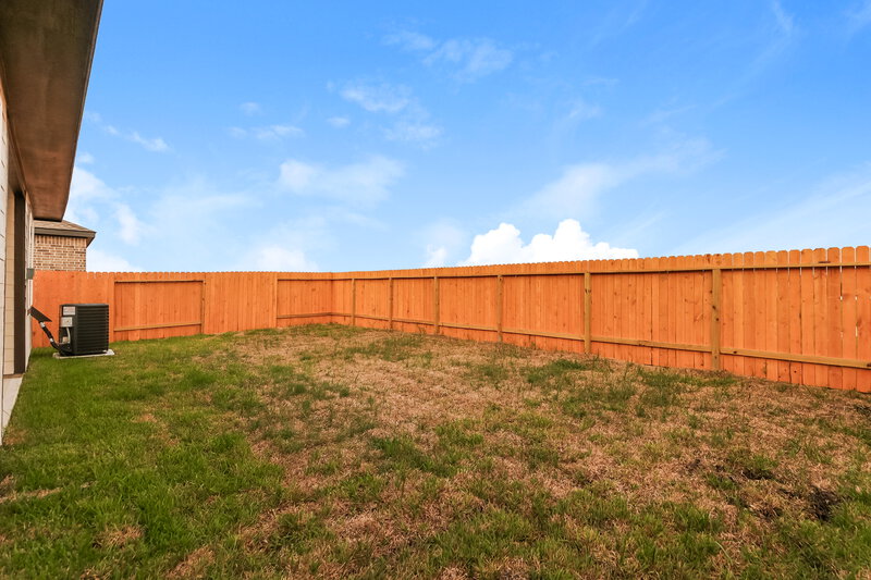 1,815/Mo, 7619 Tipton Meadow Way Richmond, TX 77469 Backyard View