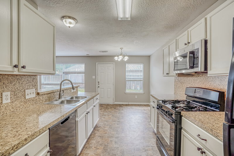 1,855/Mo, 10514 Southway Bend Ln Houston, TX 77034 Kitchen View 2