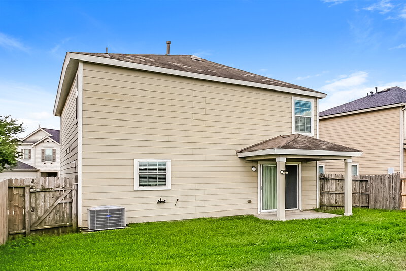 1,750/Mo, 7802 Sagemark Ridge Dr Cypress, TX 77433 Rear View