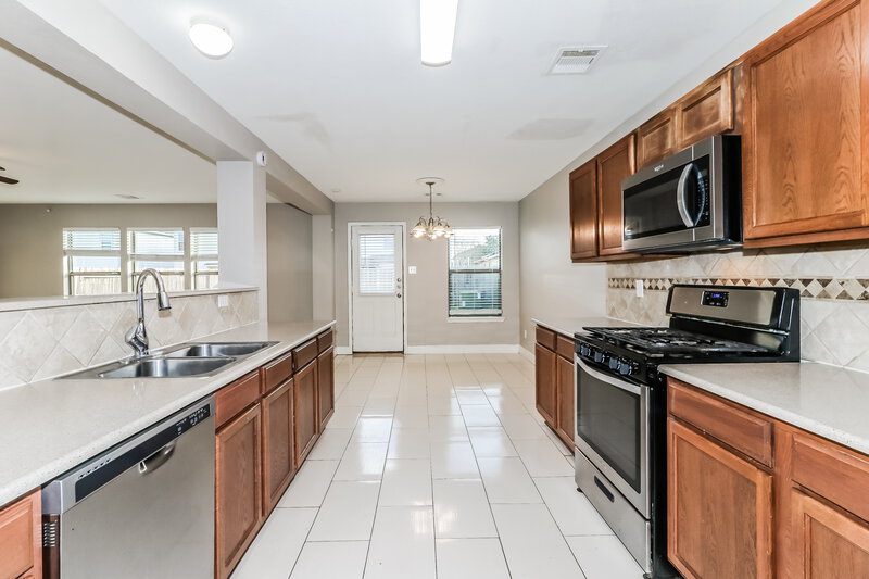 1,720/Mo, 18427 Westgate Pasture Lane Cypress, TX 77433 Kitchen View 2