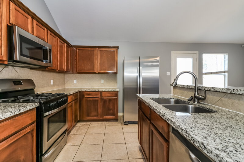 1,780/Mo, 11738 Elizabeth Court Pinehurst, TX 77362 Kitchen View