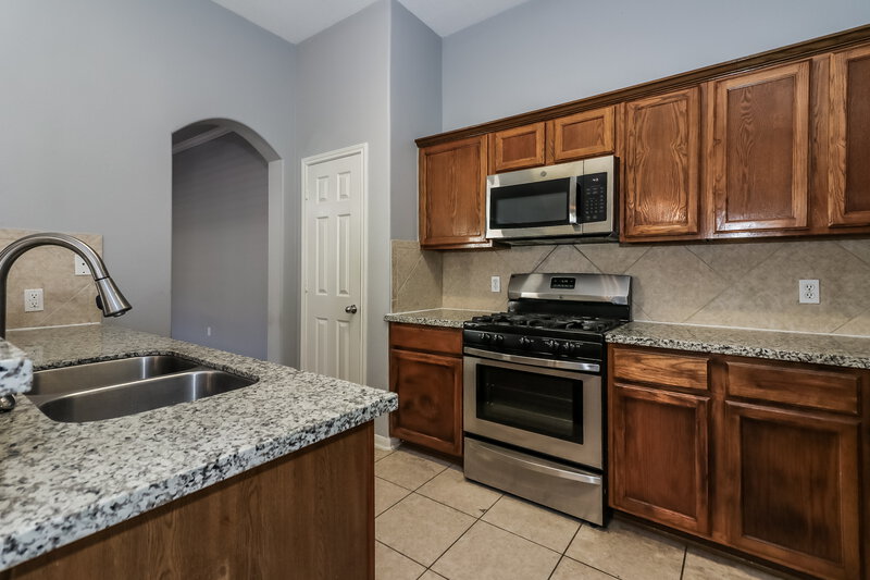 1,780/Mo, 11738 Elizabeth Court Pinehurst, TX 77362 Kitchen View 2