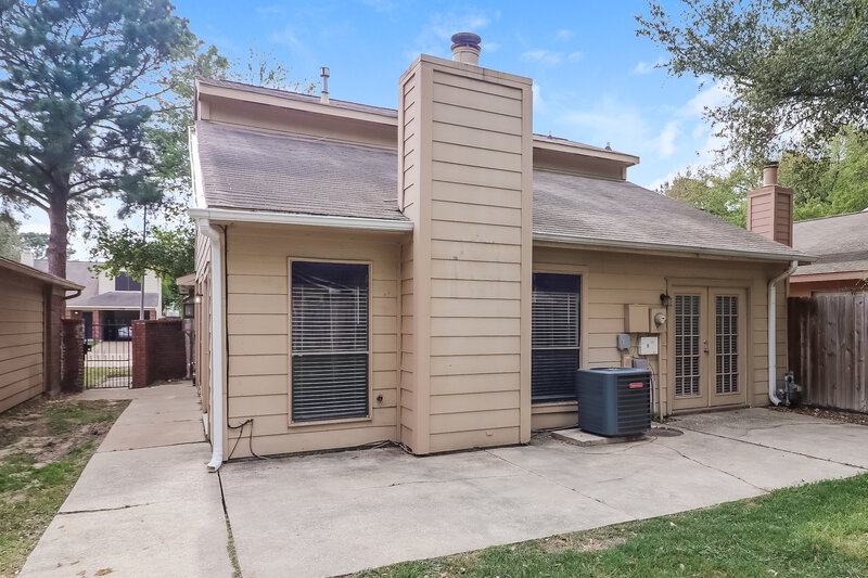 1,905/Mo, 7722 High Village Drive Houston, TX 77095 Rear View 2