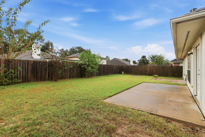 1,980/Mo, 3122 Rainpark Lane Katy, TX 77449 Backyard View