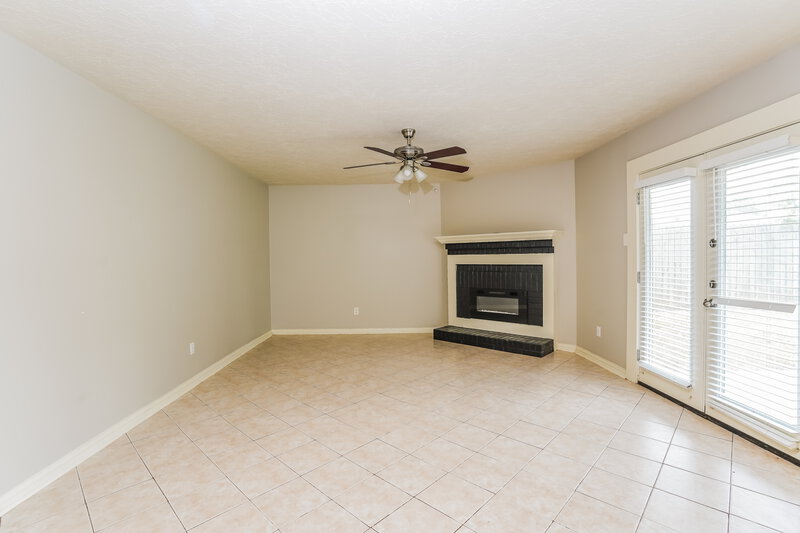 2,025/Mo, 8310 Woodland Willows Dr Houston, TX 77083 Living Room View