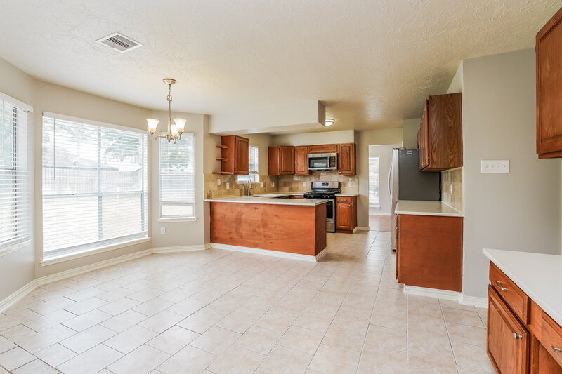 2,025/Mo, 8310 Woodland Willows Dr Houston, TX 77083 Dining Room View