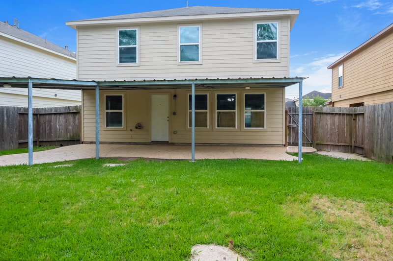2,375/Mo, 16742 Warbler Dr Conroe, TX 77385 Rear View