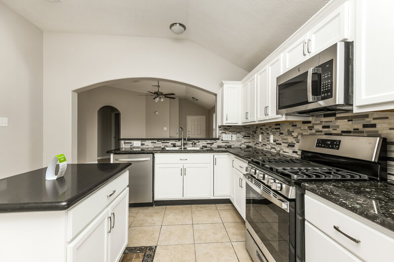 1,950/Mo, 3426 Owl Crossing Ln Humble, TX 77338 Kitchen View 3