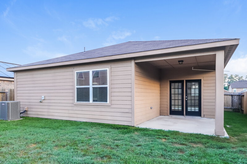 1,995/Mo, 12019 Fairquarter Ln Pinehurst, TX 77362 Rear View