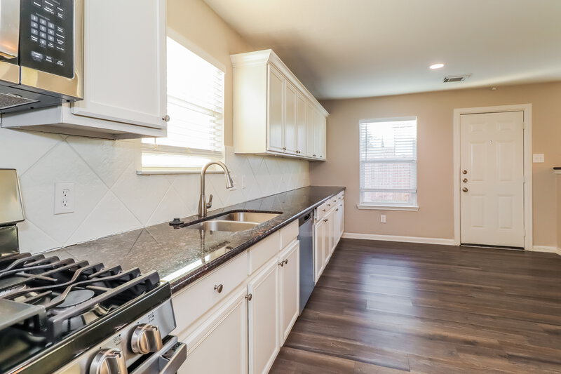 2,320/Mo, 7023 Falling Cherry Pl Houston, TX 77049 Kitchen View 2
