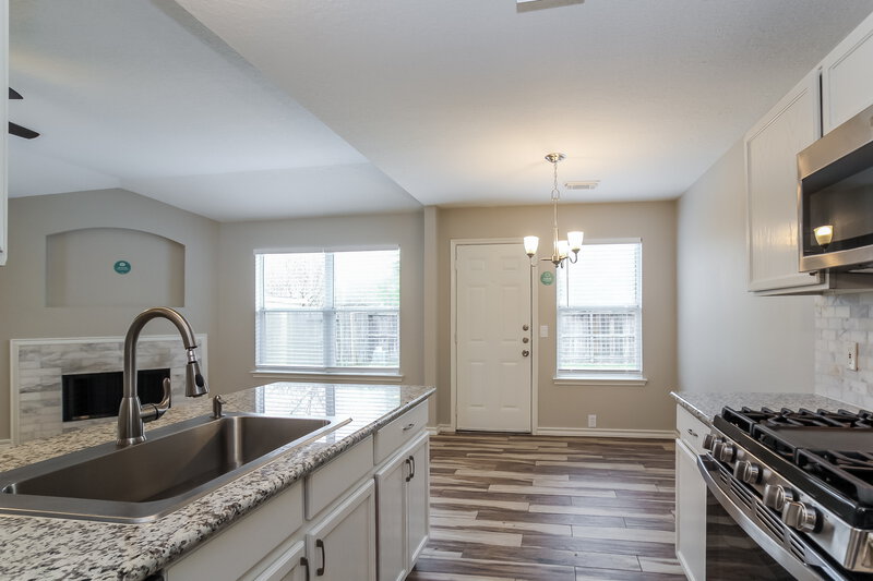 1,715/Mo, 18207 Trinity Knoll Way Humble, TX 77346 Kitchen View 2