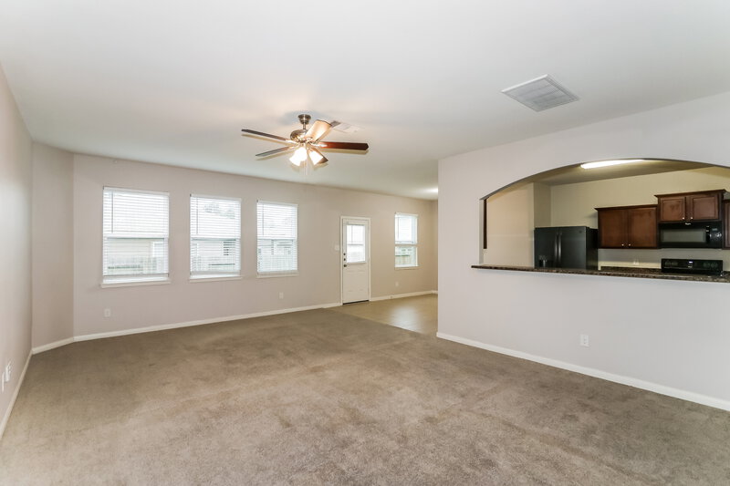 1,995/Mo, 12074 Fairquarter Ln Pinehurst, TX 77362 Living Room View