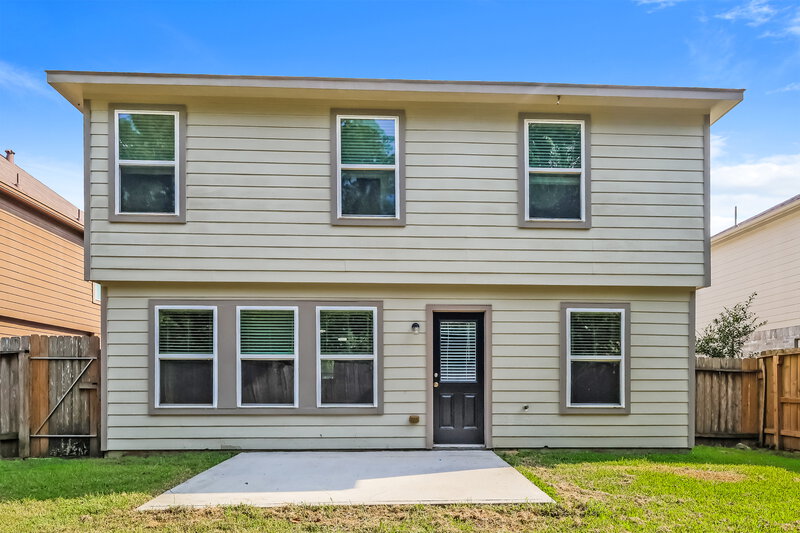 1,940/Mo, 9969 Kingfisher Dr Conroe, TX 77385 Rear View