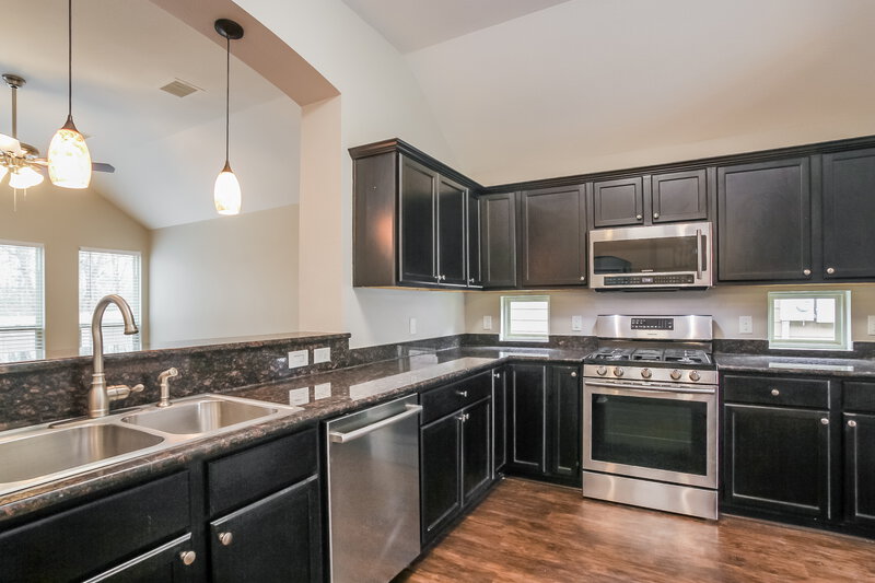 2,045/Mo, 5808 Olde Oaks Dr Willis, TX 77378 Kitchen View 2