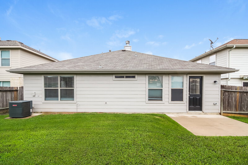 1,980/Mo, 21007 Harvest Terrace Ln Spring, TX 77379 Rear View