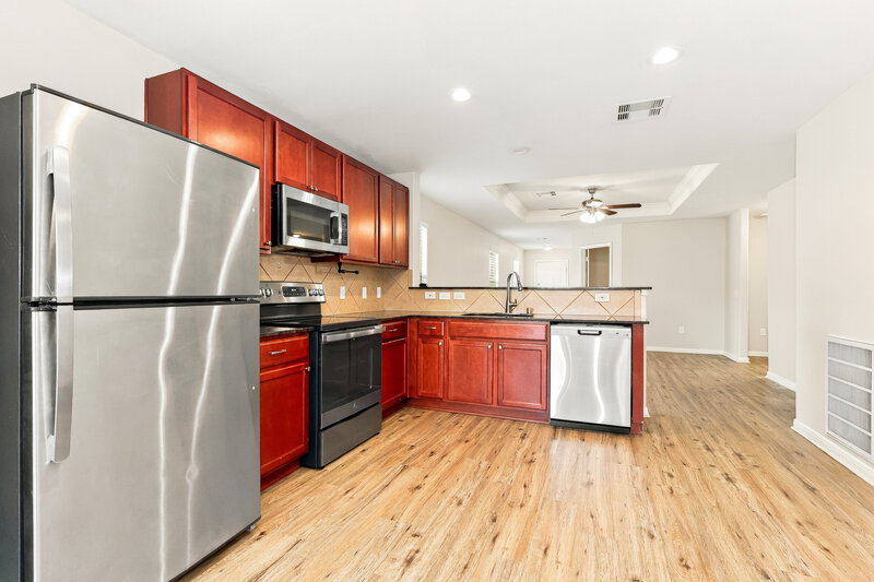 1,885/Mo, 9927 Sanders Rose Ln Houston, TX 77044 Kitchen View 2