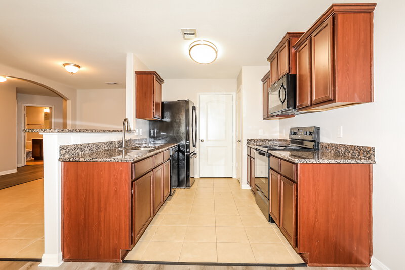 1,865/Mo, 12039 Quartersawn Ln Pinehurst, TX 77362 Kitchen View