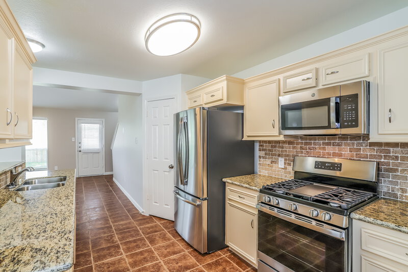 2,020/Mo, 8238 Fuqua Gardens Dr Houston, TX 77075 Kitchen View 2