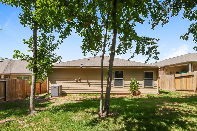 1,670/Mo, 7522 Fettle Ln Conroe, TX 77304 Rear View