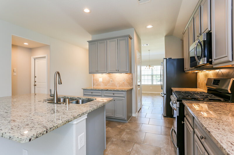 2,475/Mo, 18027 Svensson Slade Ln Houston, TX 77044 Kitchen View 2