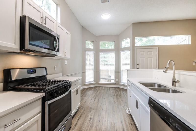 2,265/Mo, 57 Wood Scent Ct The Woodlands, TX 77380 Kitchen View 2