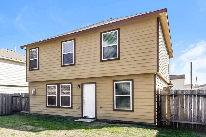 1,740/Mo, 16746 Warbler Dr Conroe, TX 77385 Rear View