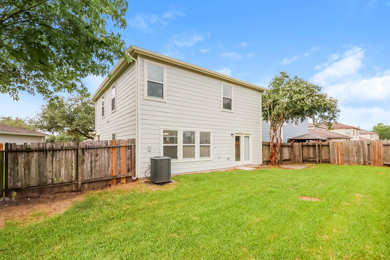 2,145/Mo, 6806 Oleander Grove Way Houston, TX 77049 Rear View