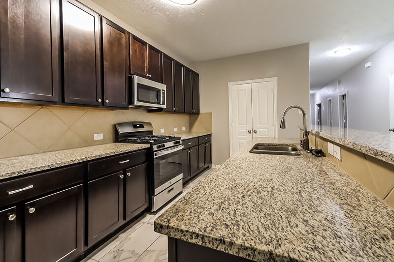 2,115/Mo, 6935 Hazelnut Ln Baytown, TX 77521 Kitchen View 2