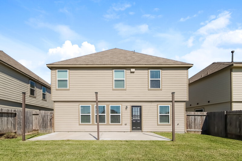 1,985/Mo, 9958 Chimney Swift Ln Conroe, TX 77385 Rear View